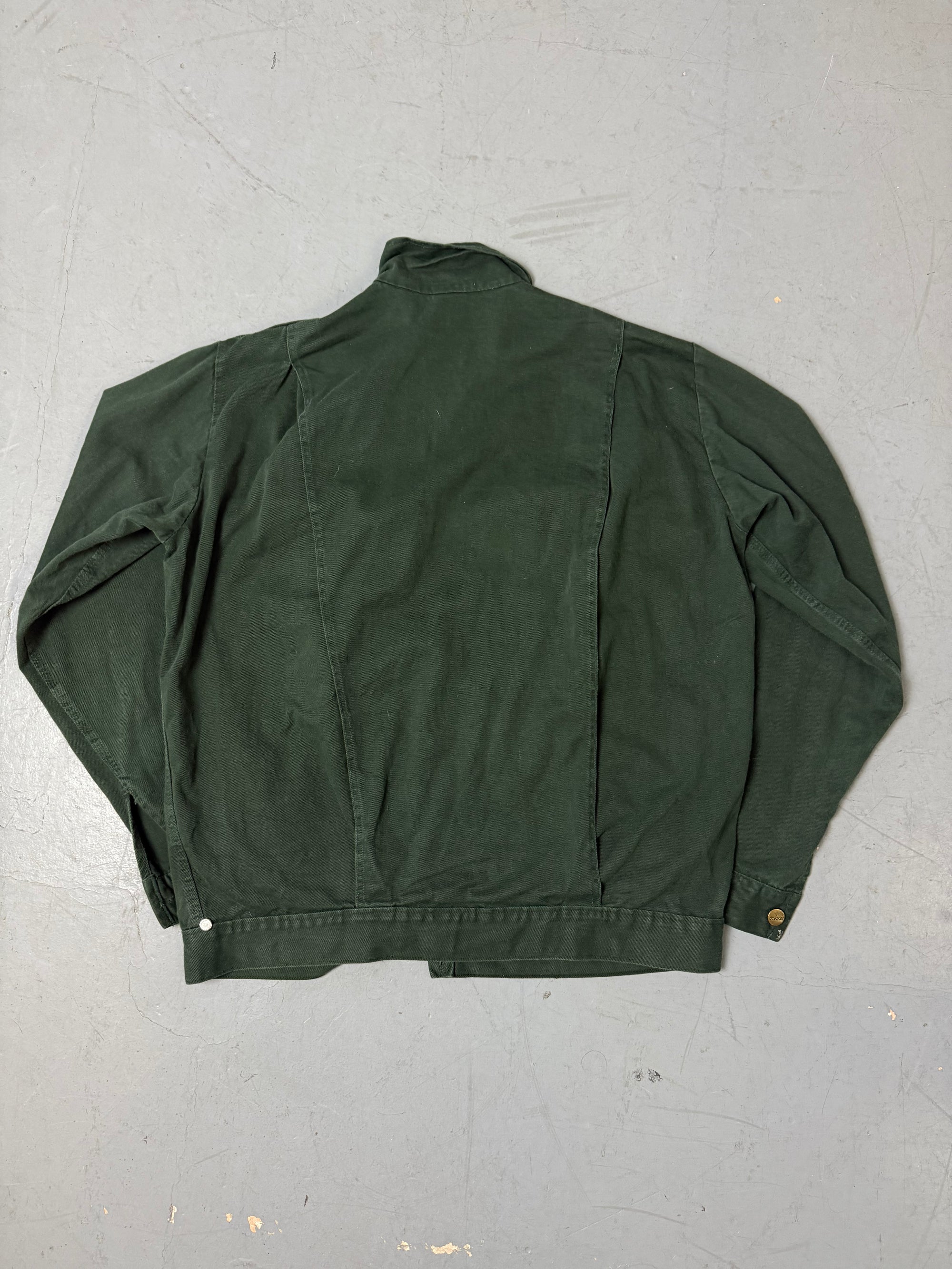 Eine grüne übergangsjacke mit Farbfleck im used workwear Look in L