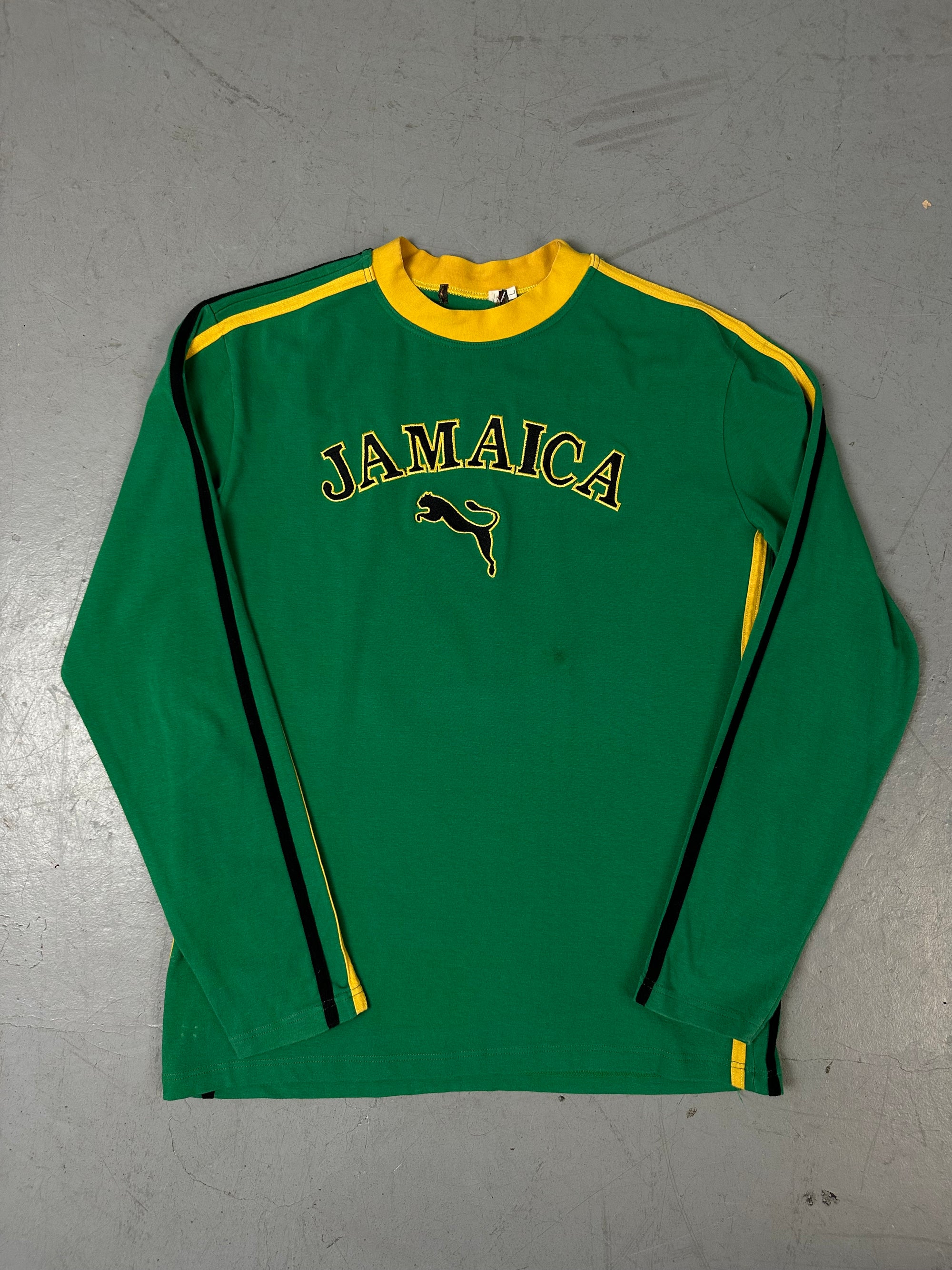 Ein grün gelbes longsleeve mit Jamaica Aufschrift und dem Puma Logo auf der Brust 