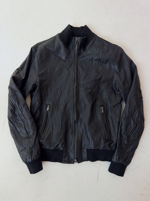 Vintage Schwarze Leder Jacke für Herren. Y2K Second Hand 2000s Fashion