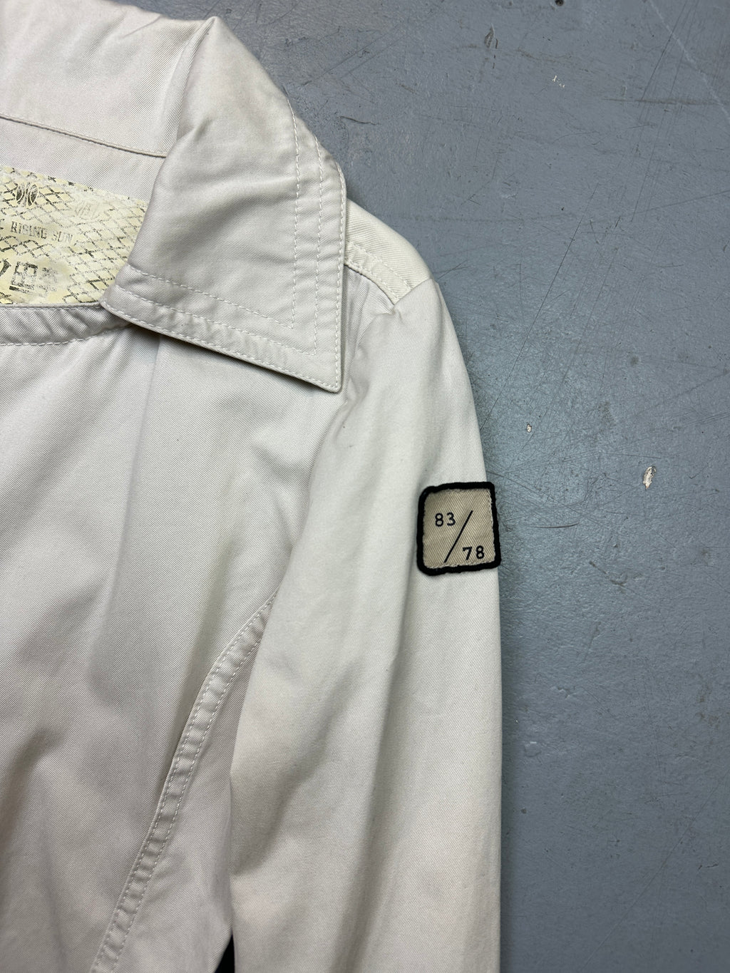 Vintage Diesel Rising Sun White Coat with asymmetrical zip. Y2K Second Hand 2000s Fashion