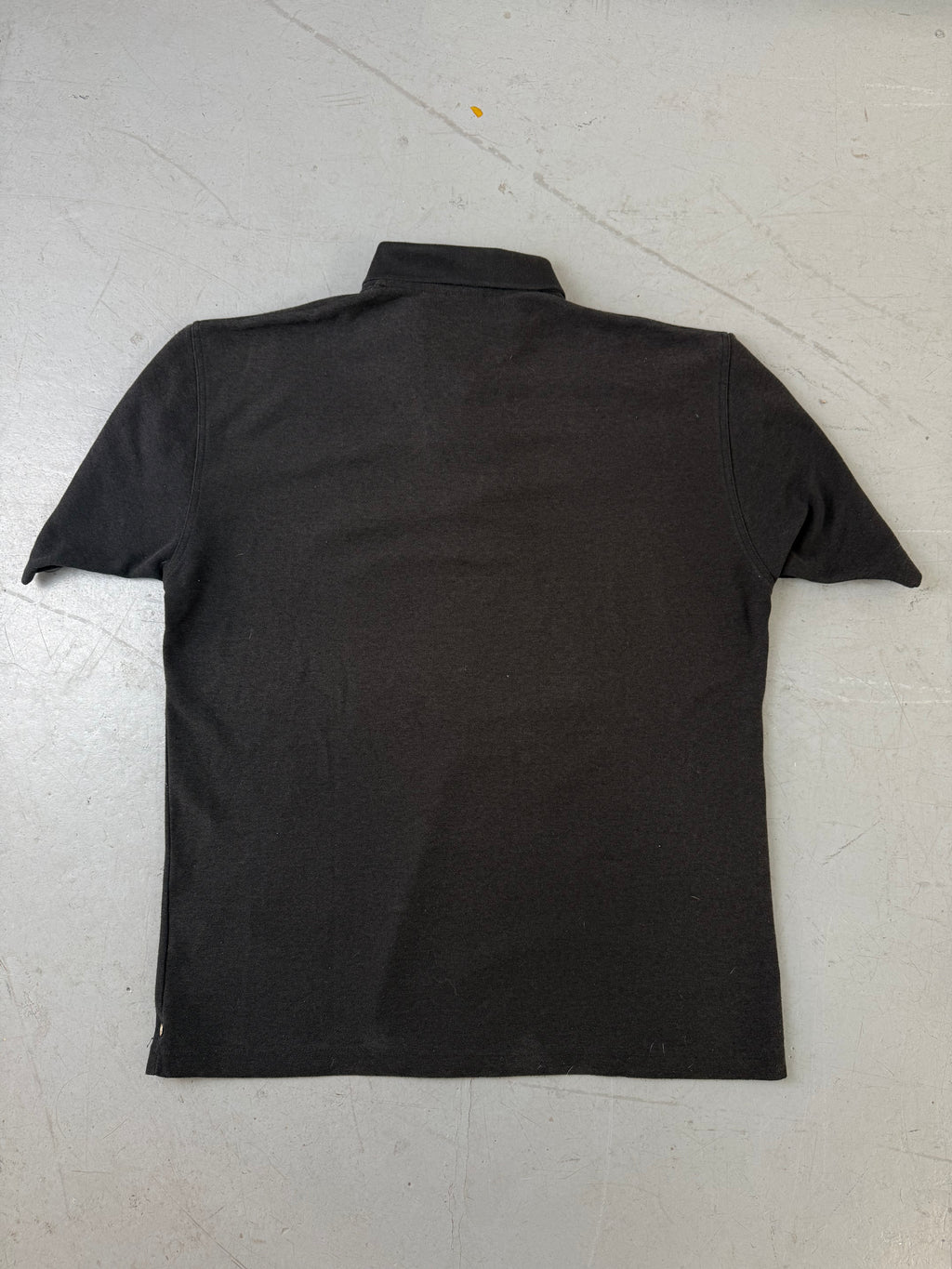 Vintage Umbro Black Polo Shirt für Herren. Y2K Second Hand 2000s Fashion