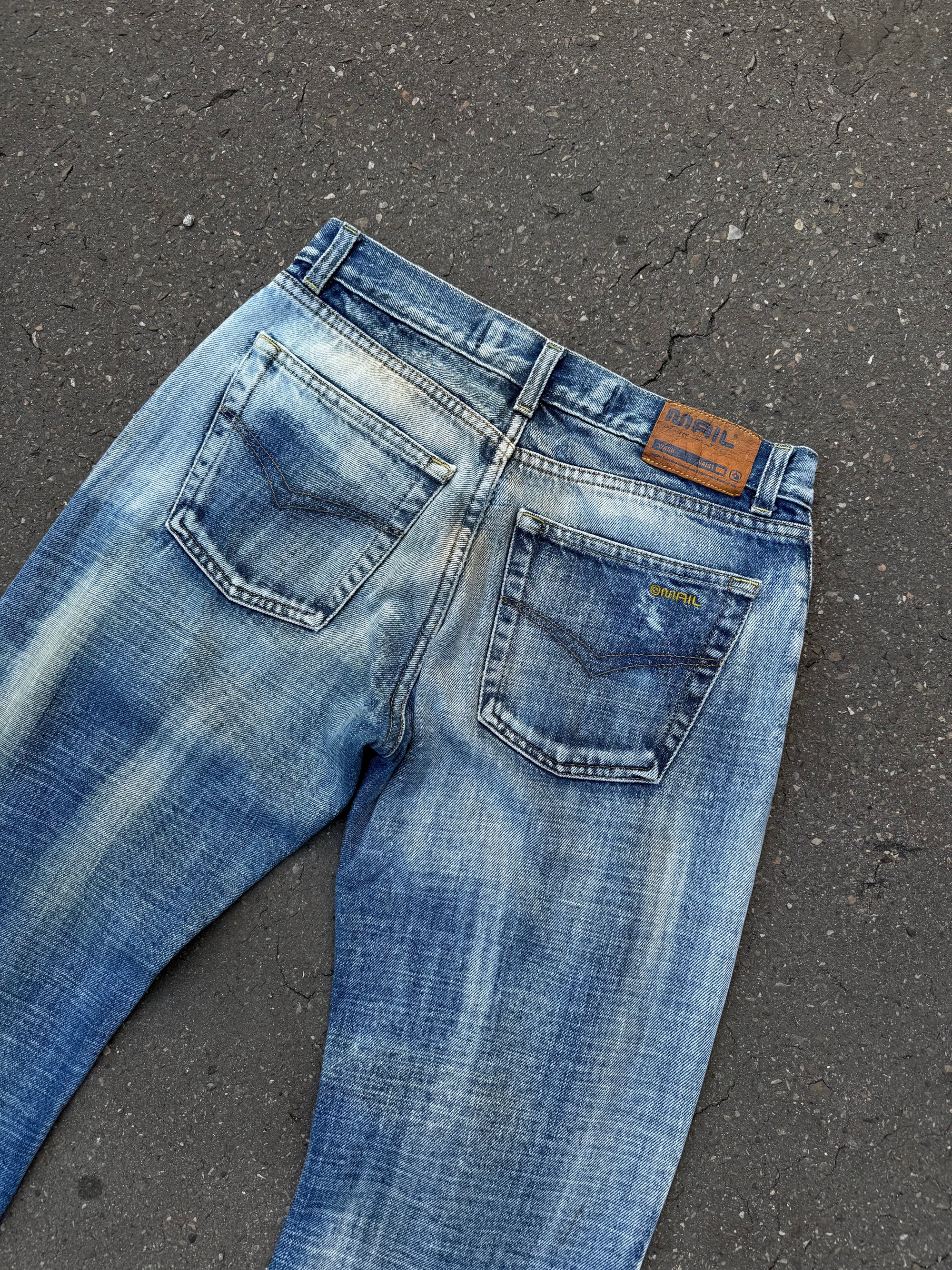 Eine Bootcut Jeans von der Marke Mail in einem Blau-Weiß-Braunen Washing in S