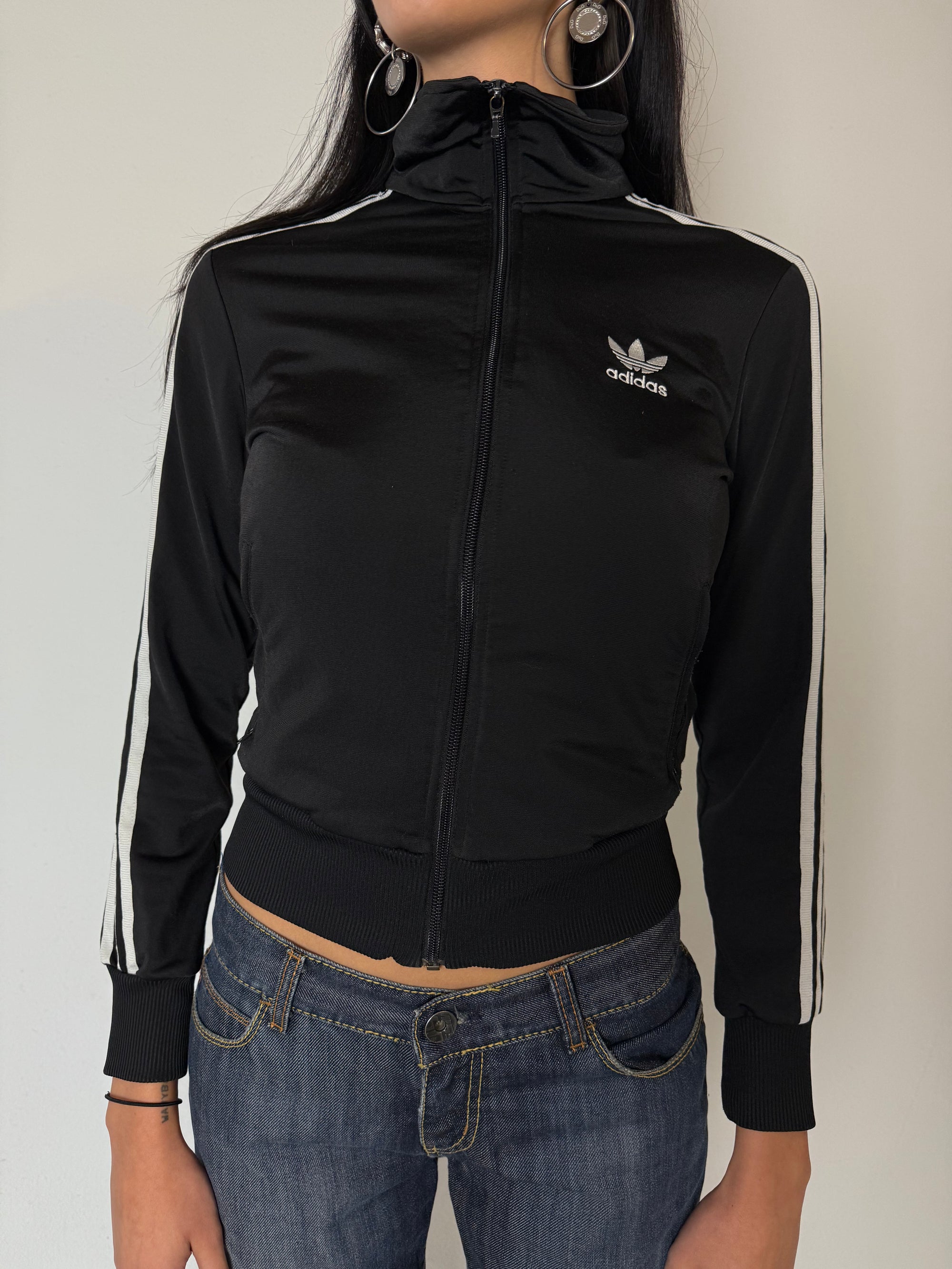 Eine schwarze Adidas Firebird Track Jacke mit weißen Streifen XS 
