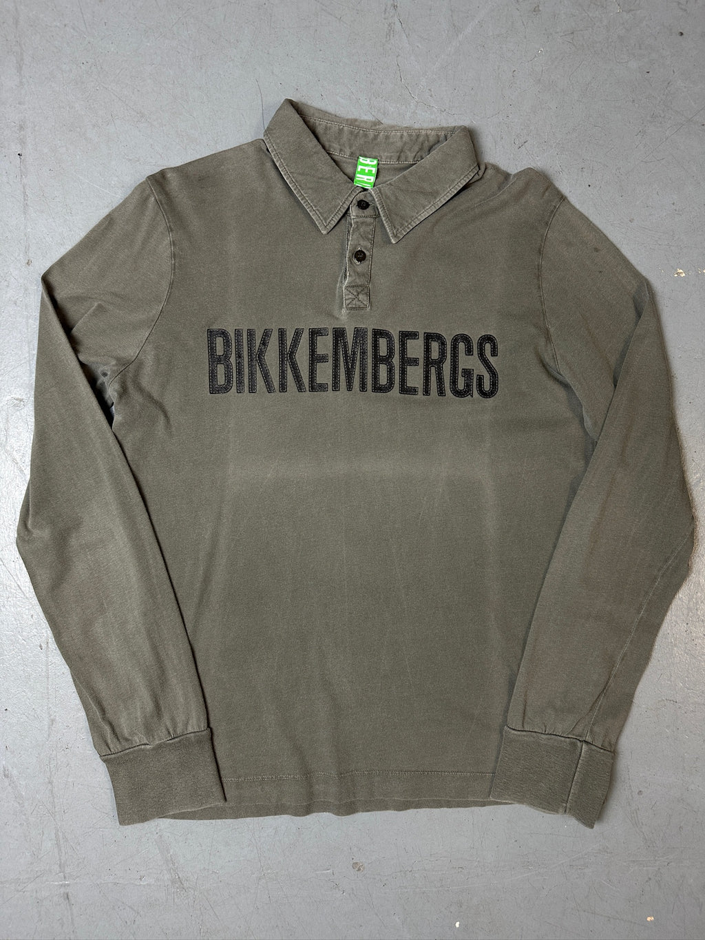 Produktbild von grauem Dirk Bikkembergs Langarm auf grauem Boden 