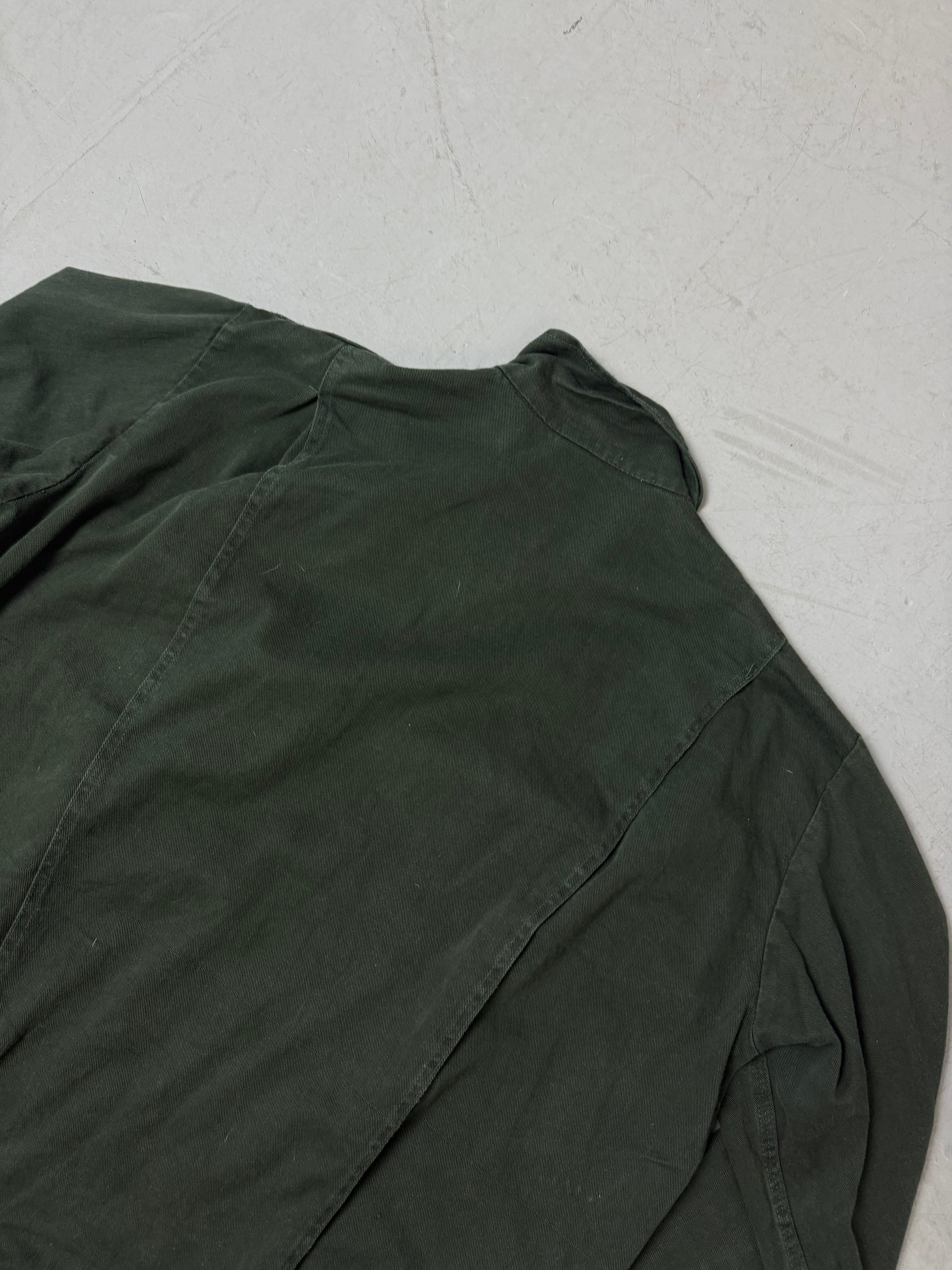 Eine grüne übergangsjacke mit Farbfleck im used workwear Look in L