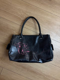 Produktbild von einer Vintage Playboy Black Bag with Pink Details von vorne