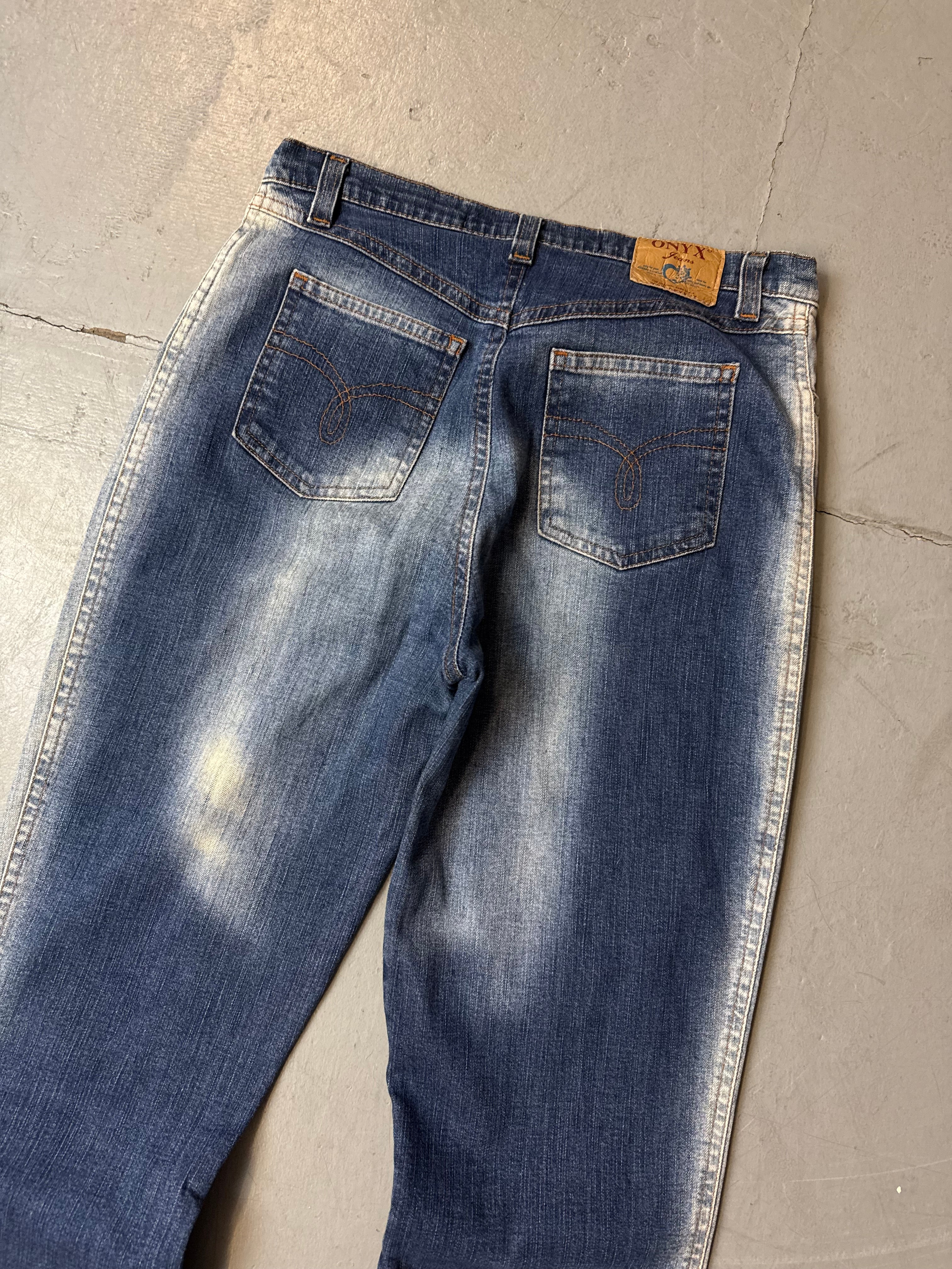 Vintage Onyx Flared Low Waist Jeans für Damen. Y2K Second Hand 2000s Fashion