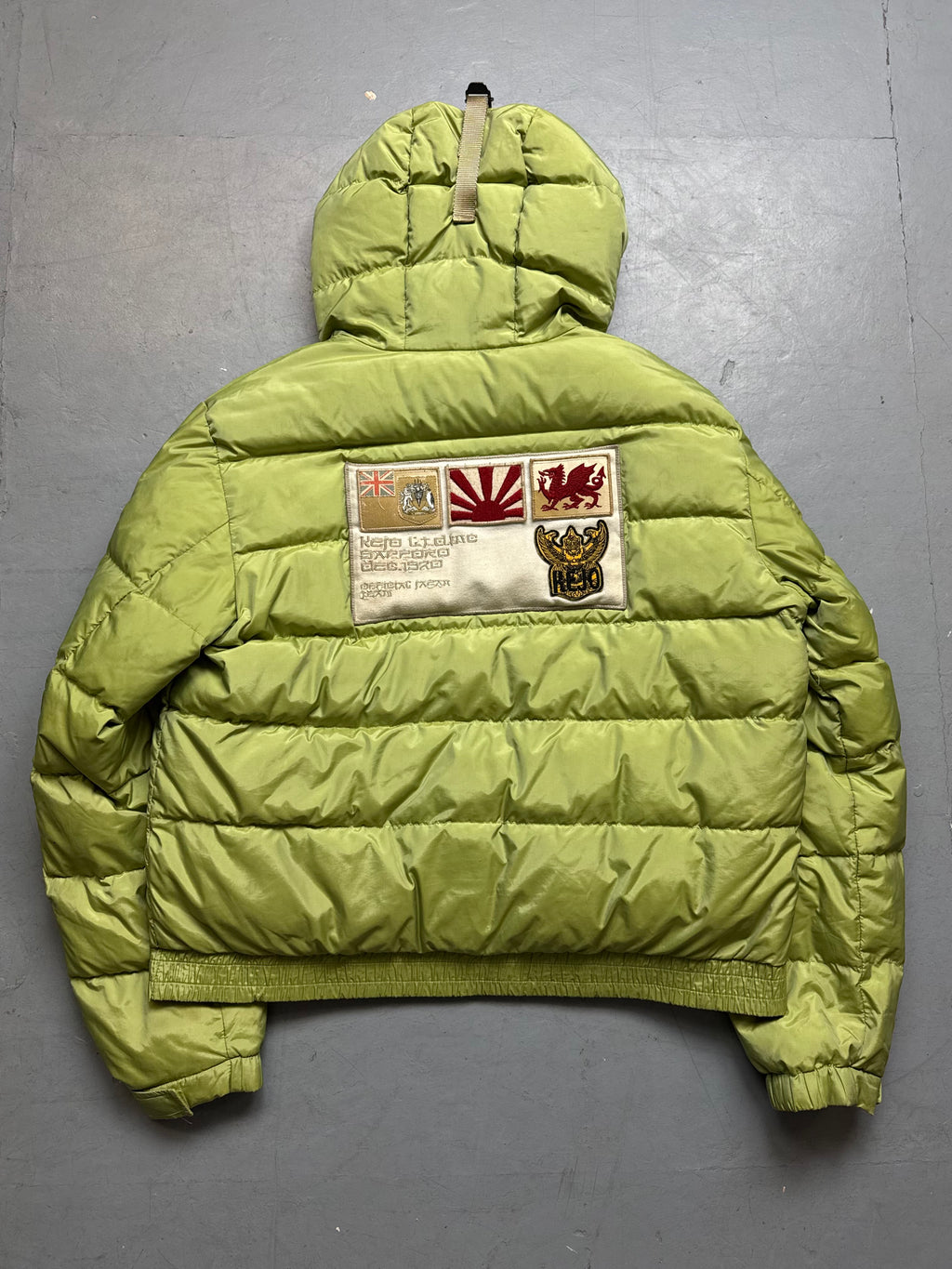 Vintage Kejo Green Patched Puffer Jacket with red details for men’s. Y2K Second Hand 2000s Fashion 