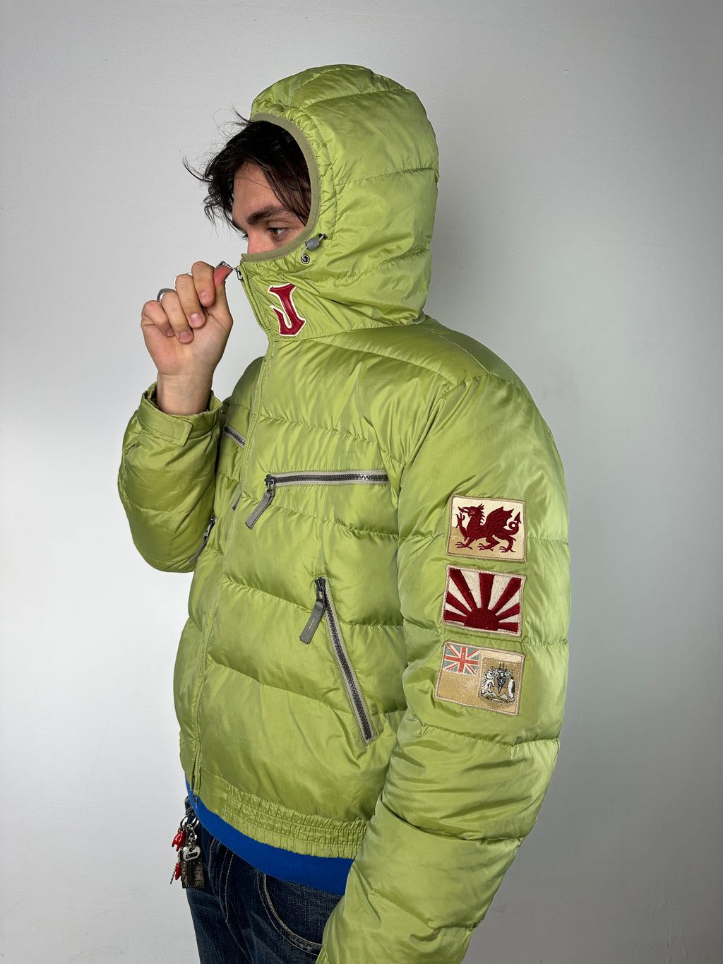 Vintage Kejo Green Patched Puffer Jacket with red details for men’s. Y2K Second Hand 2000s Fashion 