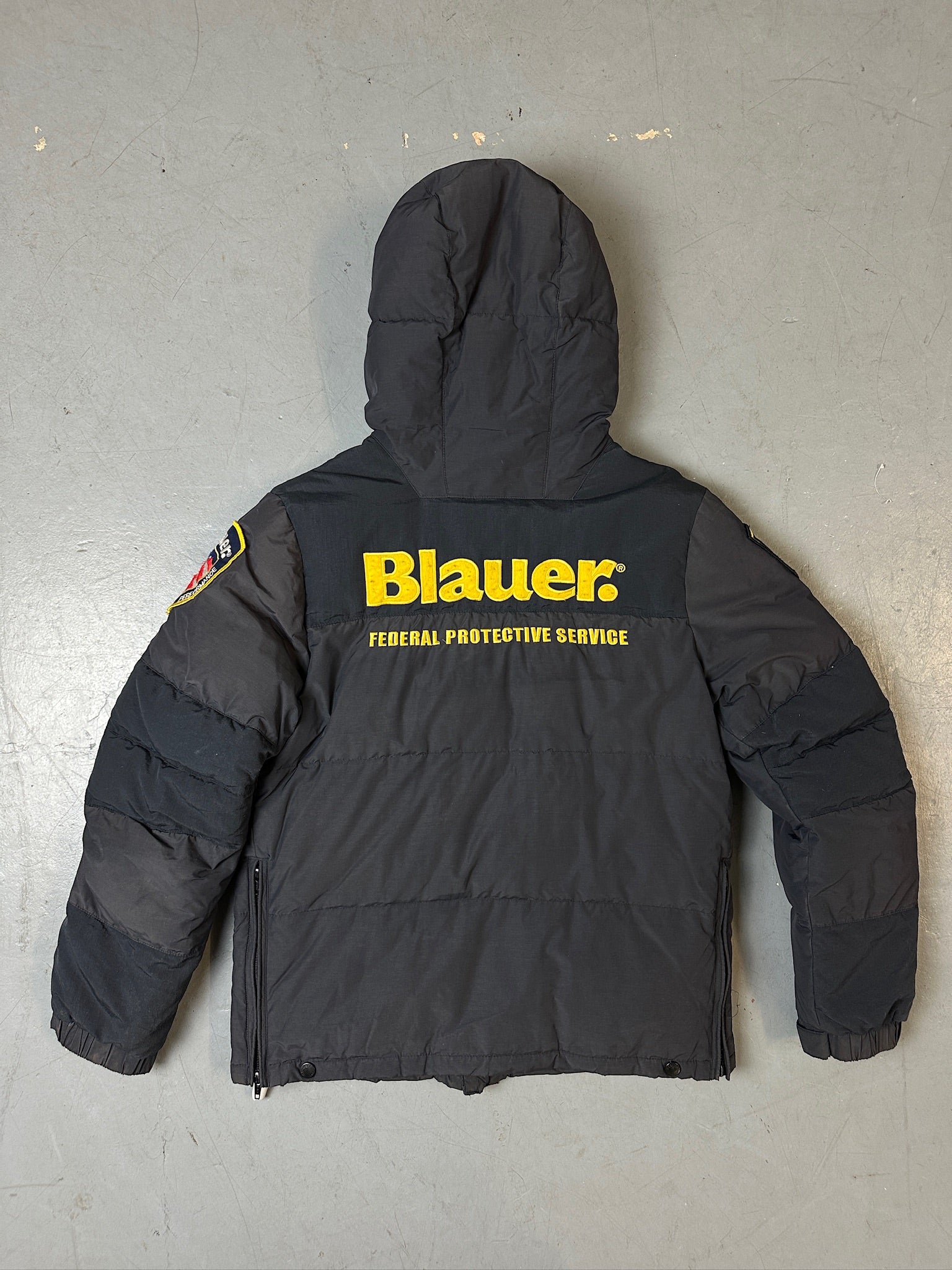 Produktbild von Grauer Blauer Daunen Jacke in L für grauem Boden
