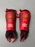 Vintage Umbro Manchester United Shinguard. Y2K Secondhand 2000s Fashion.