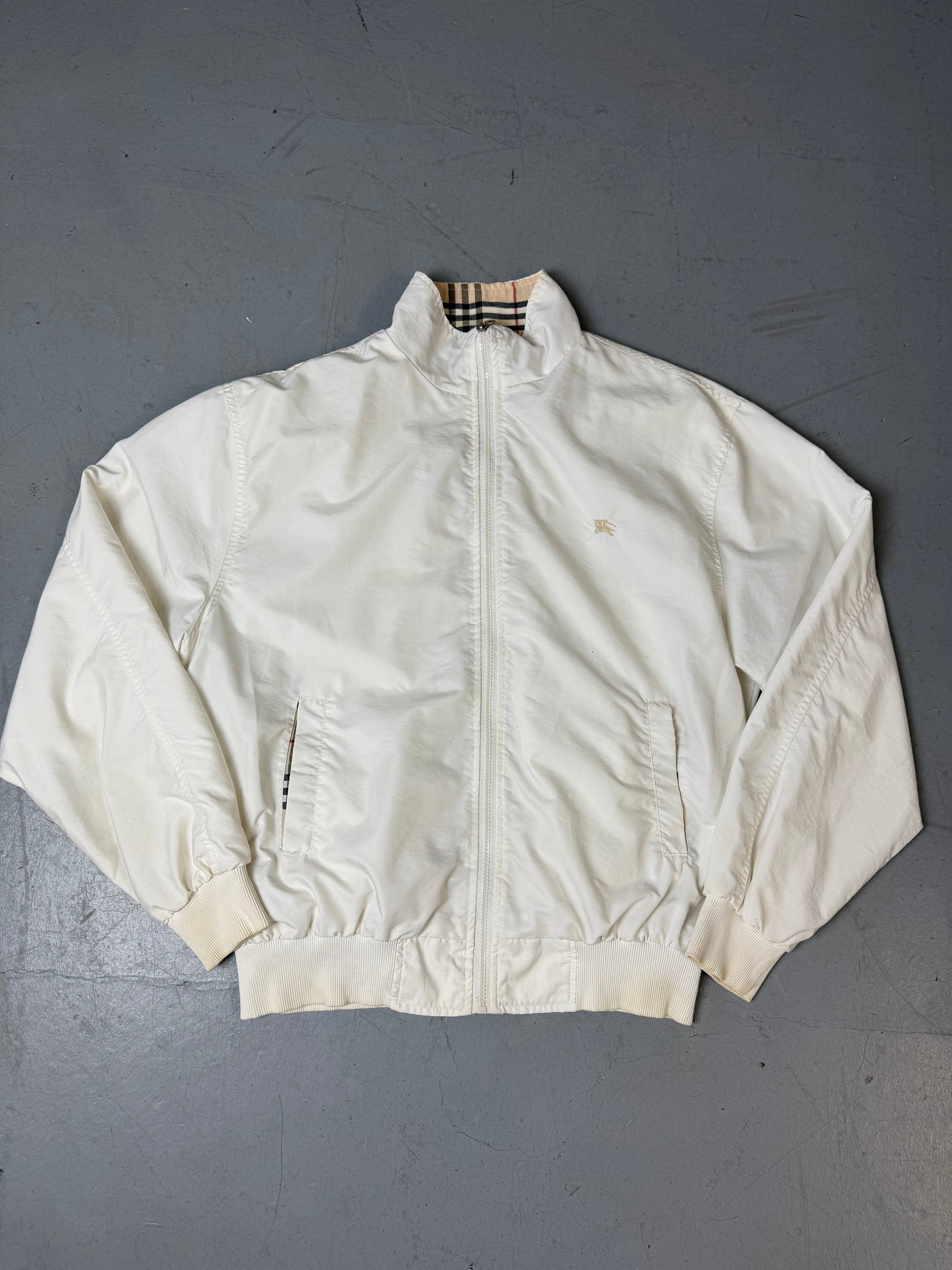 Eine weiße Burberry Regenjacke in L