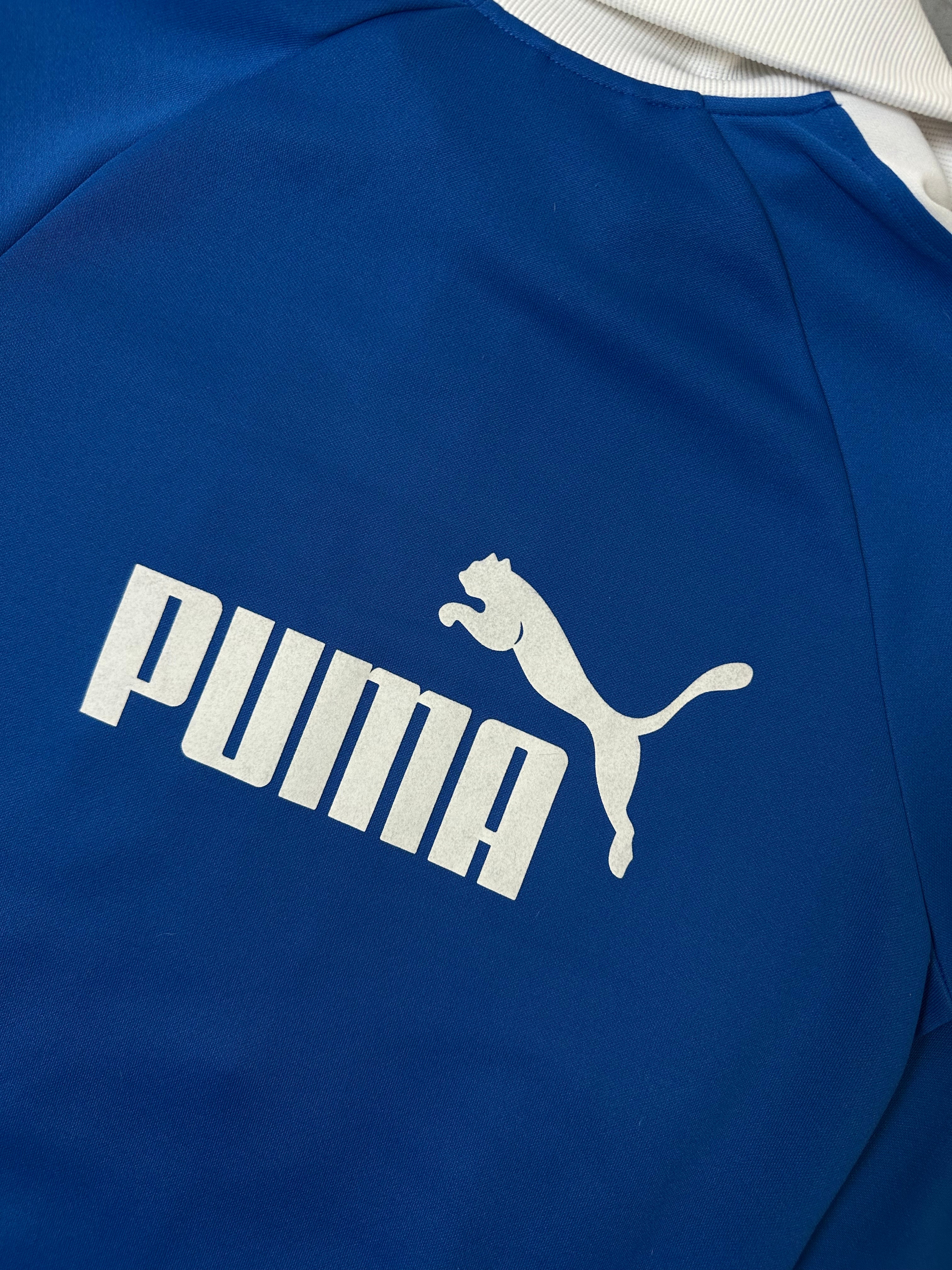 Ein Blau weißes Set von Puma bestehend aus Trackjacke und Trackpants in M/L