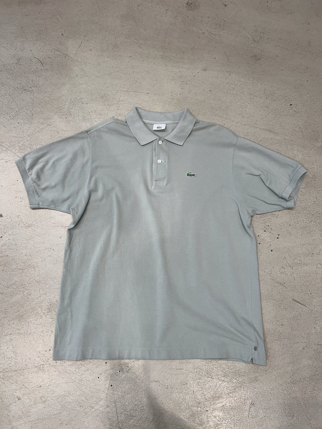 Vintage Lacoste Poloshirt für Herren. Y2K Second Hand 2000s Fashion.