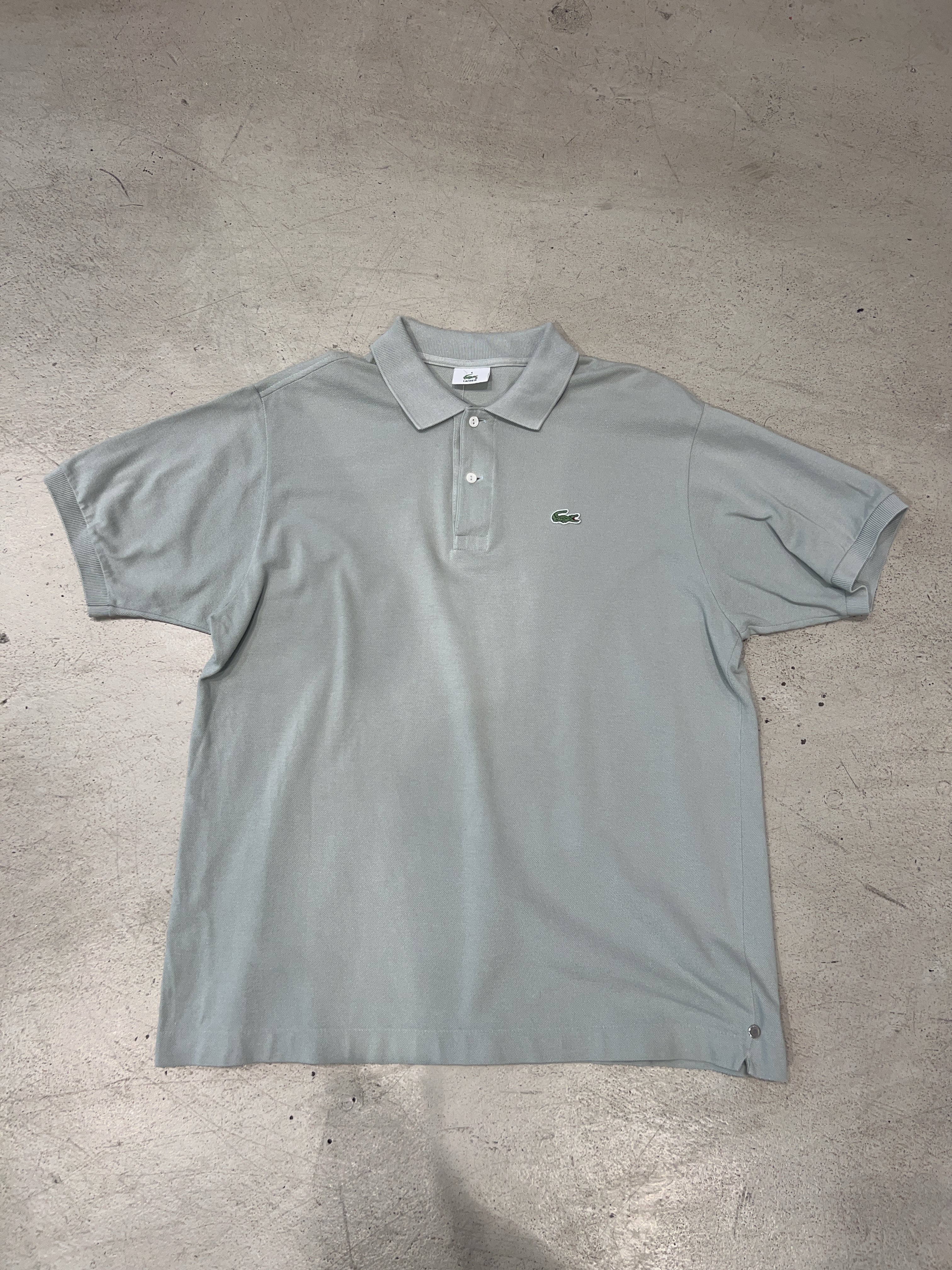 Vintage Lacoste Poloshirt für Herren. Y2K Second Hand 2000s Fashion.