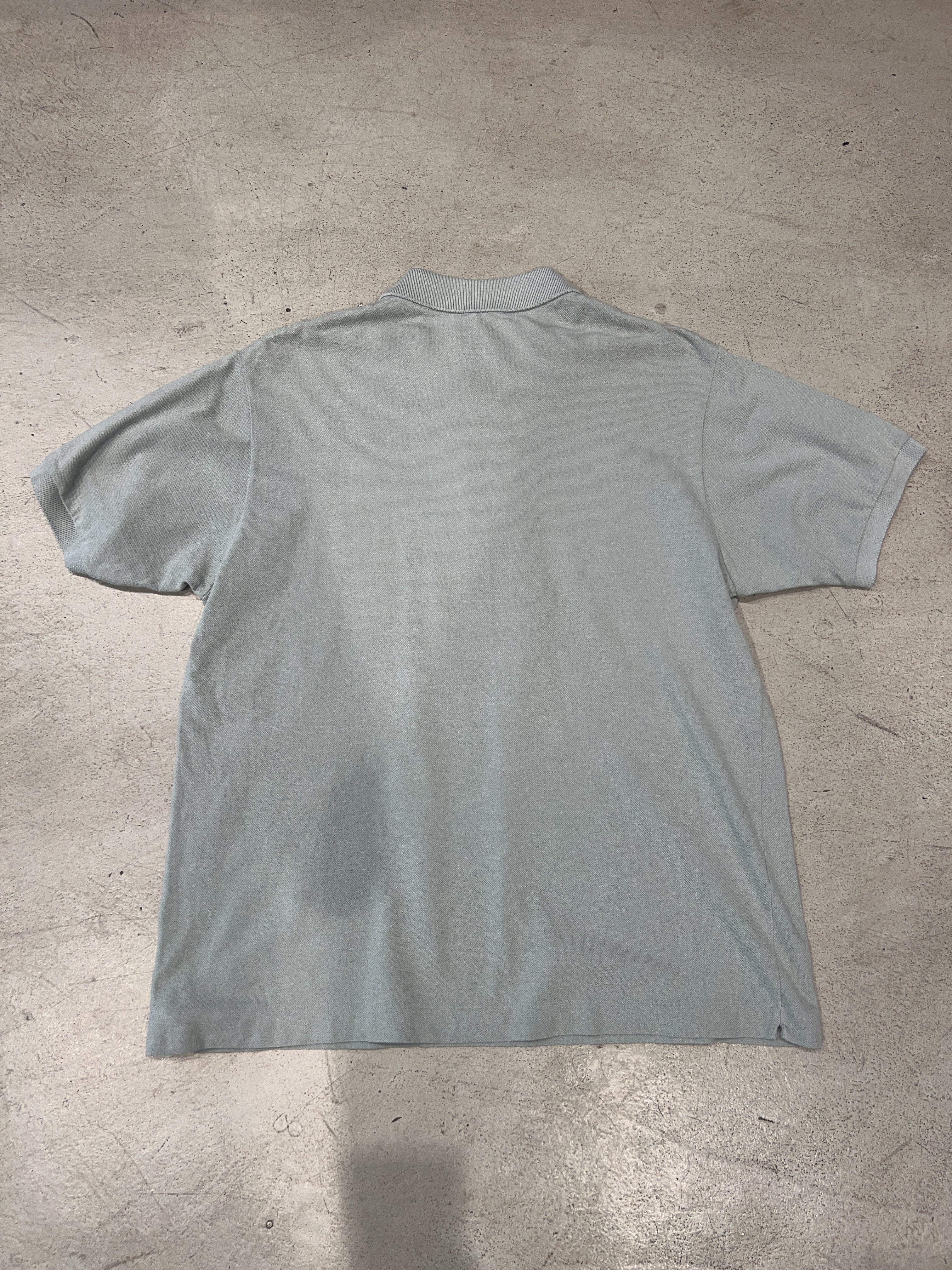 Vintage Lacoste Poloshirt für Herren. Y2K Second Hand 2000s Fashion.