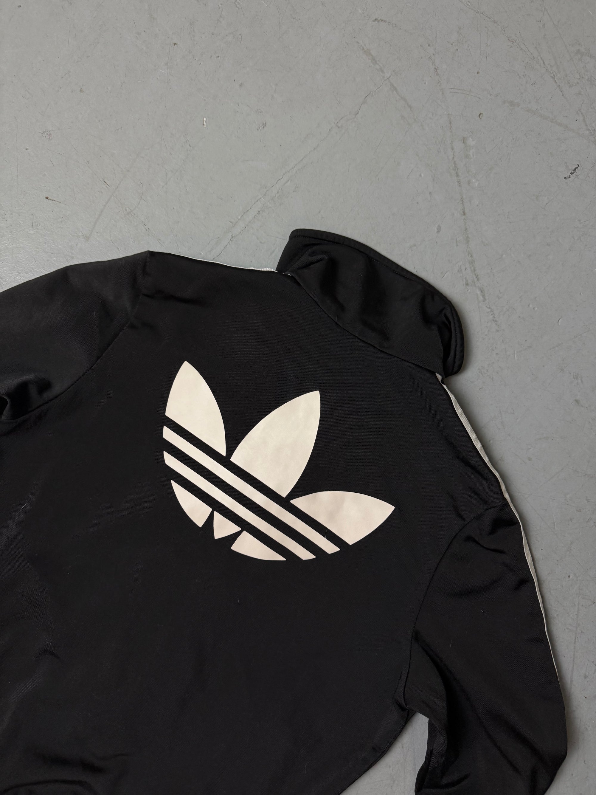 Eine schwarze Adidas Firebird Track Jacke mit weißen Streifen XS 