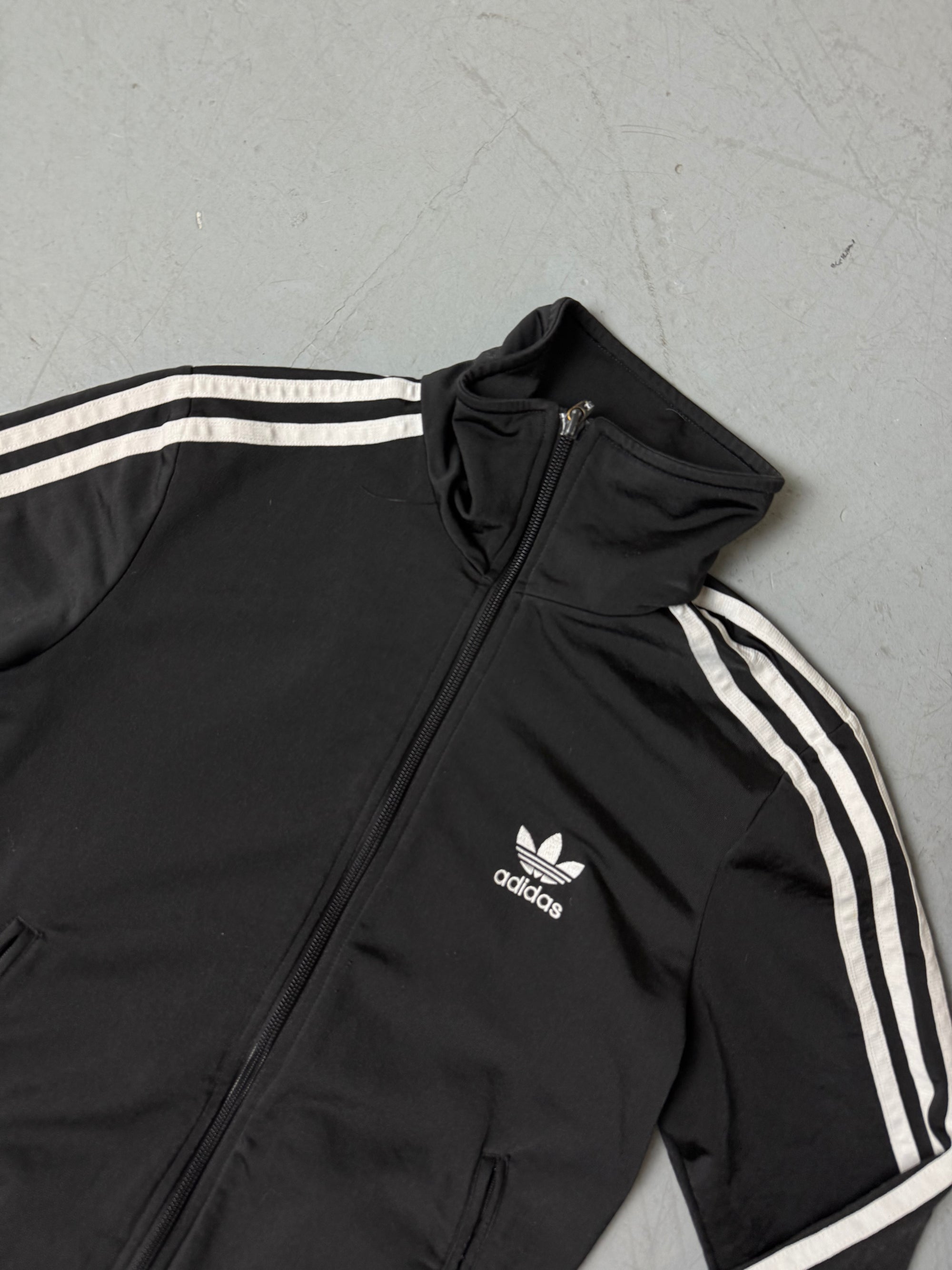Eine schwarze Adidas Firebird Track Jacke mit weißen Streifen XS 