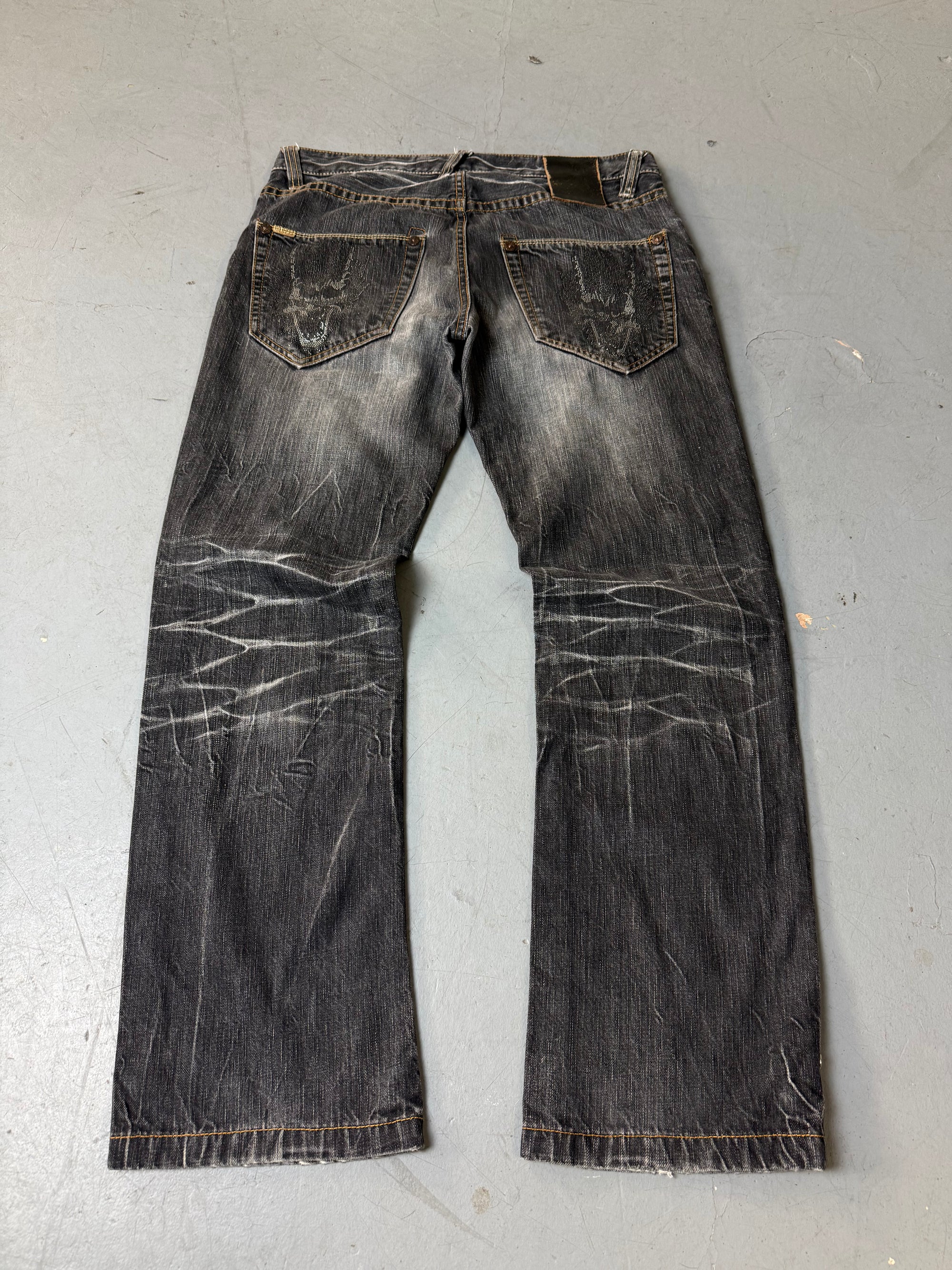 Produktbild von einer Vintage Oniarai Grey Washed Ripped Denim von Hinten