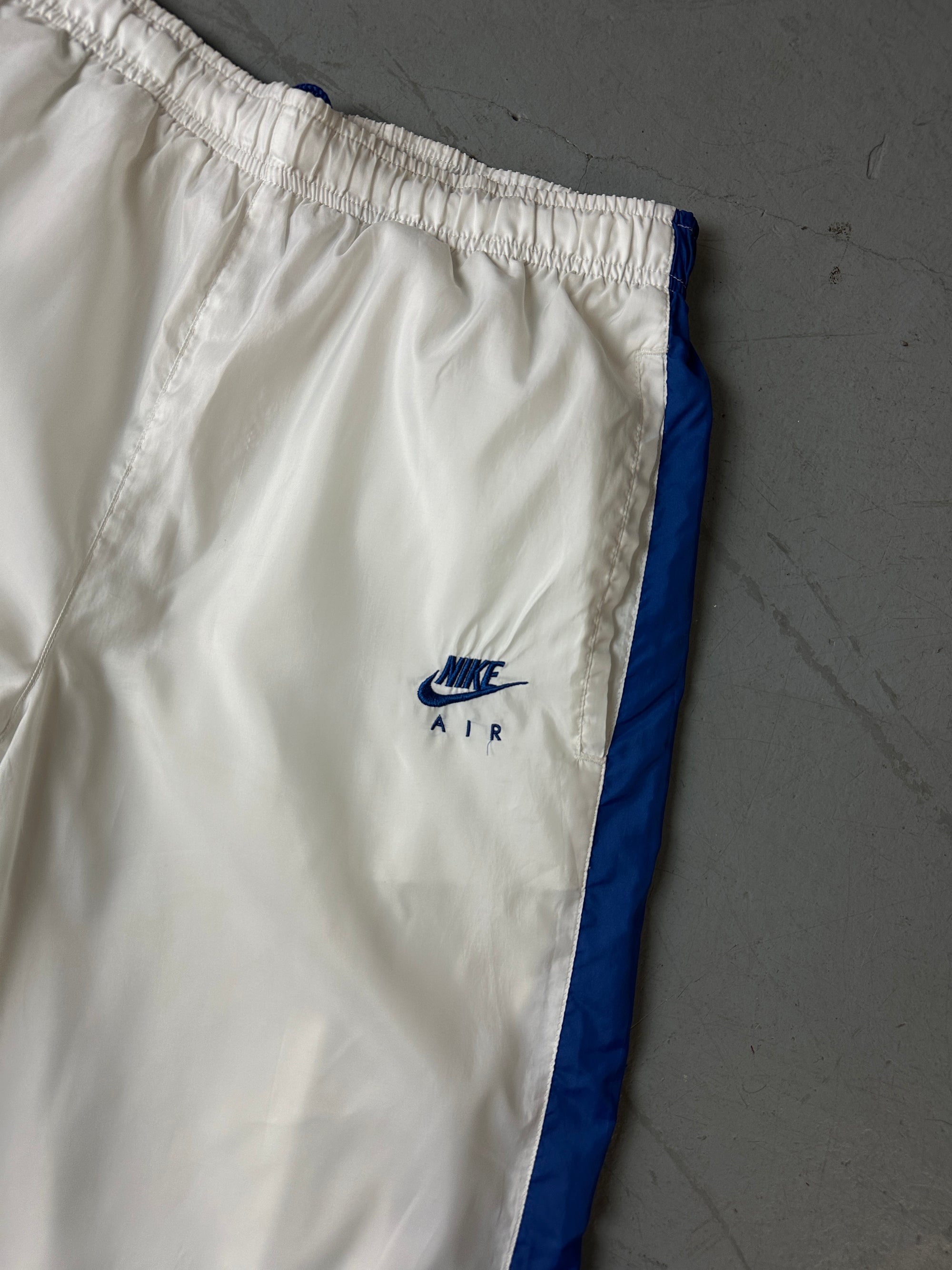 Detailbild von Vintage Nike White/Blue Trackpants von vorne