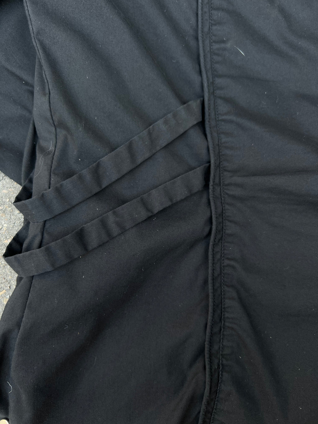 Eine schwarze Bluse von Diego Reiga in S mit Rüschen