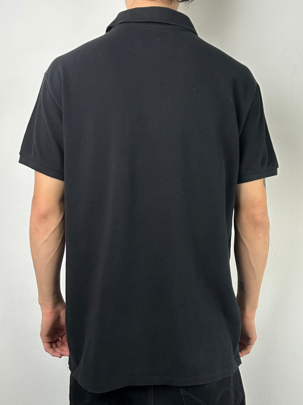 Vintage Armani Jeans Black Polo Jeans für Herren. Y2K Second Hand 2000s Fashion