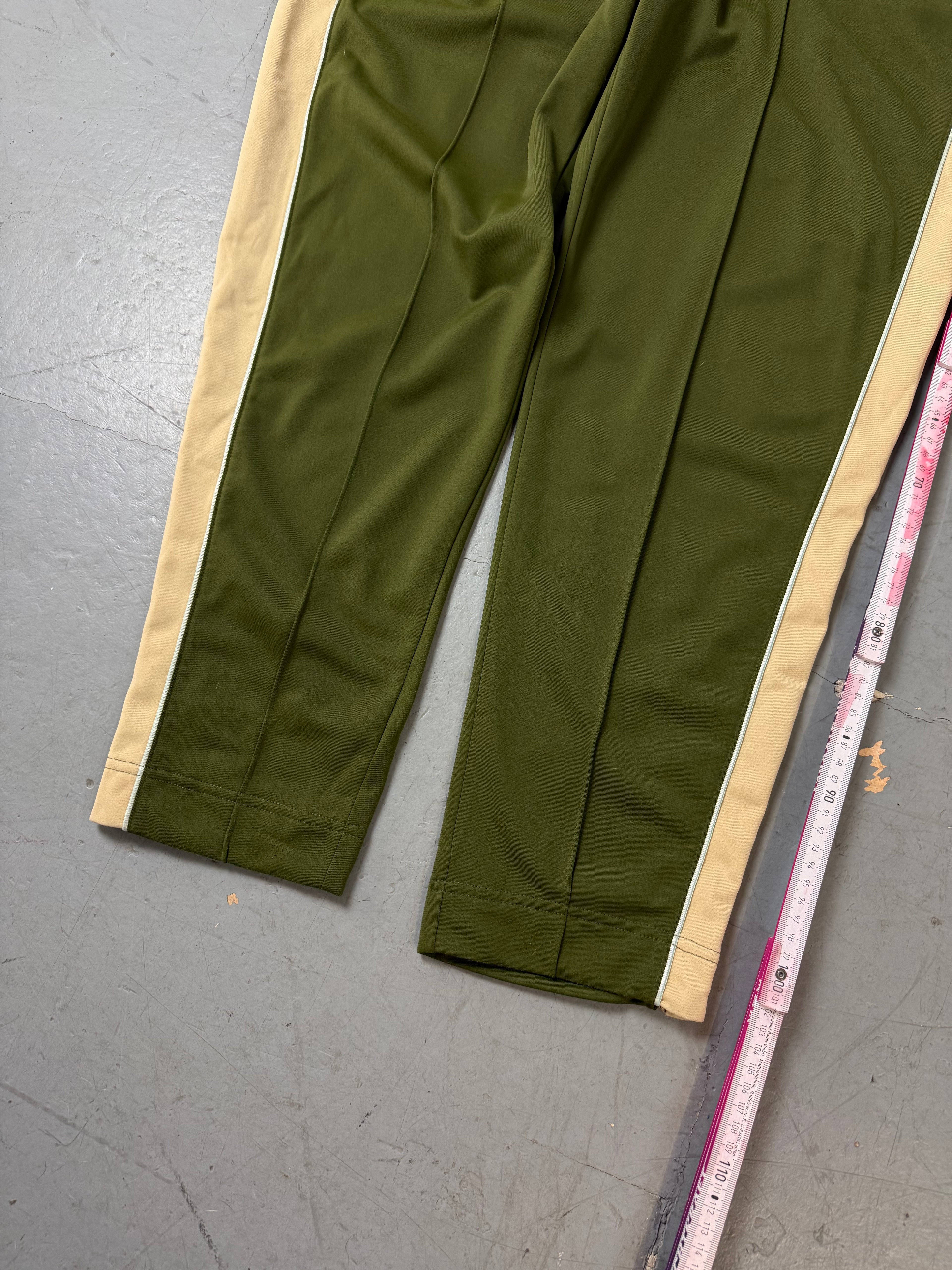 Vintage Nike Green and Beige Track Pant für Herren. Y2K Second Hand 2000s Fashion