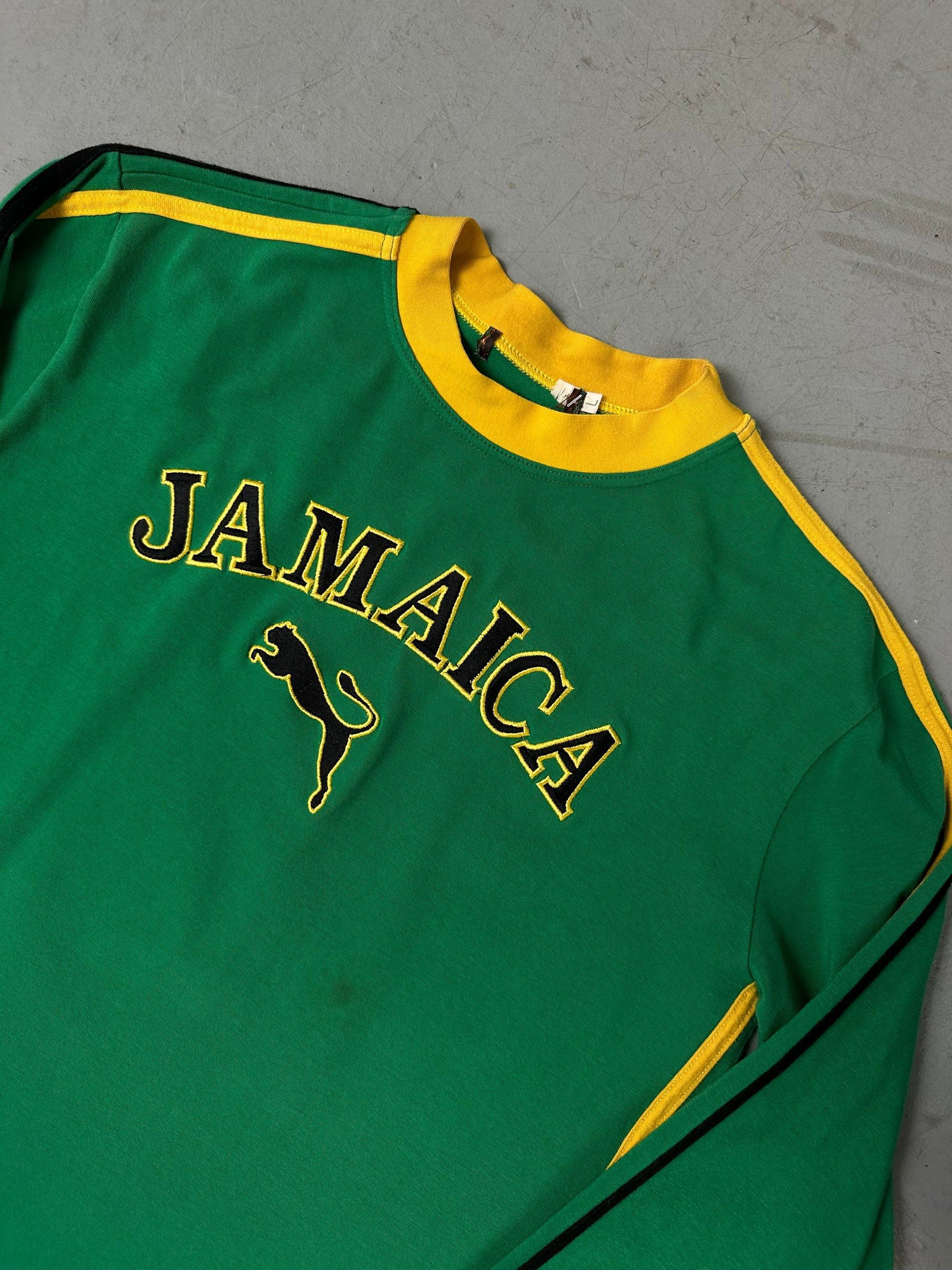 Ein grün gelbes longsleeve mit Jamaica Aufschrift und dem Puma Logo auf der Brust 