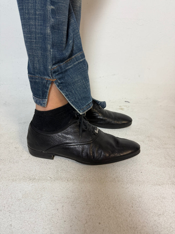 Schwarze gucci Oxford Schuhe mit leichtem Absatz und gucci Logo auf den Schnürsenkeln 