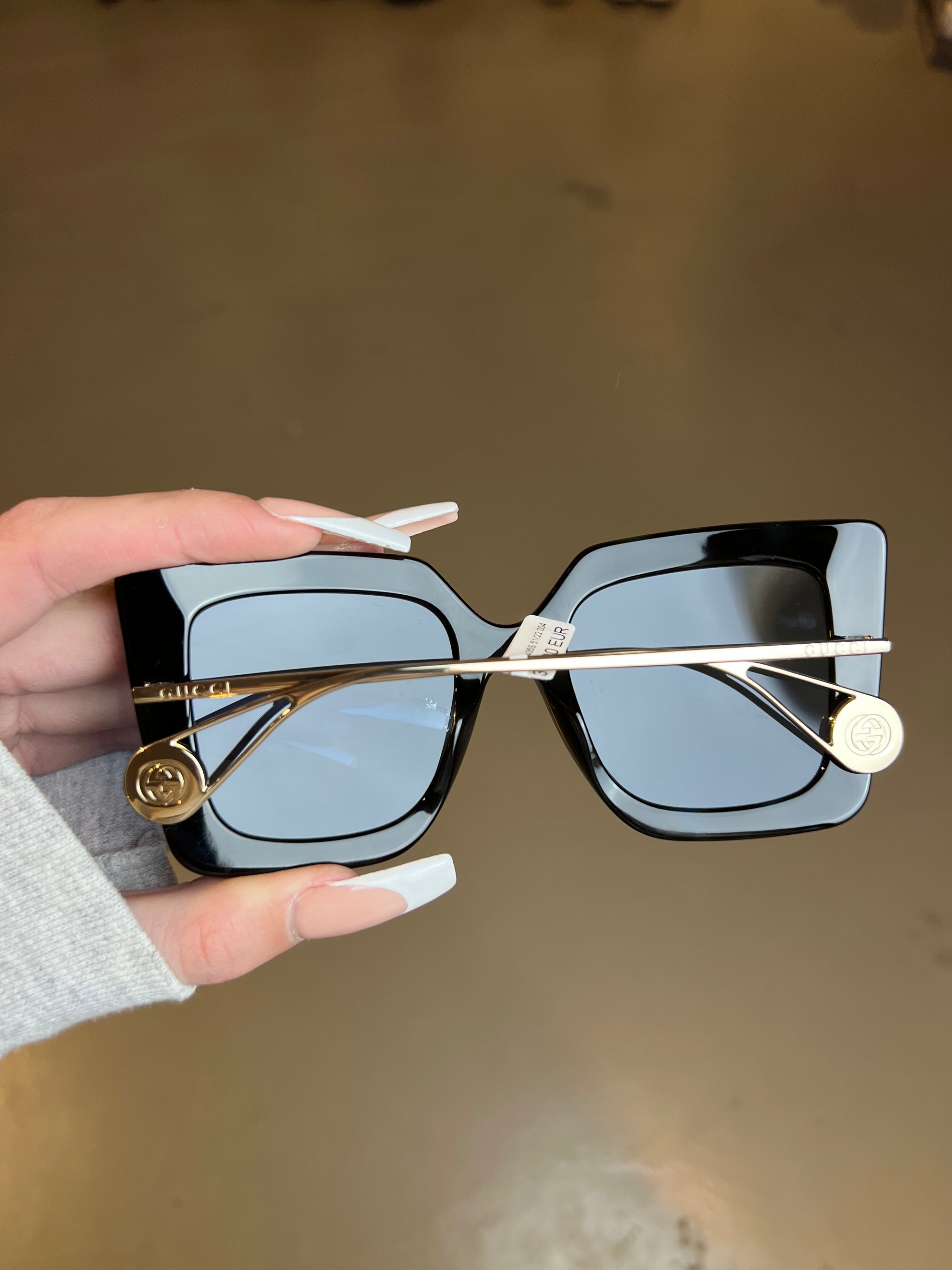 Produktbild der Gucci Sunglasses in Schwarz von hinten.