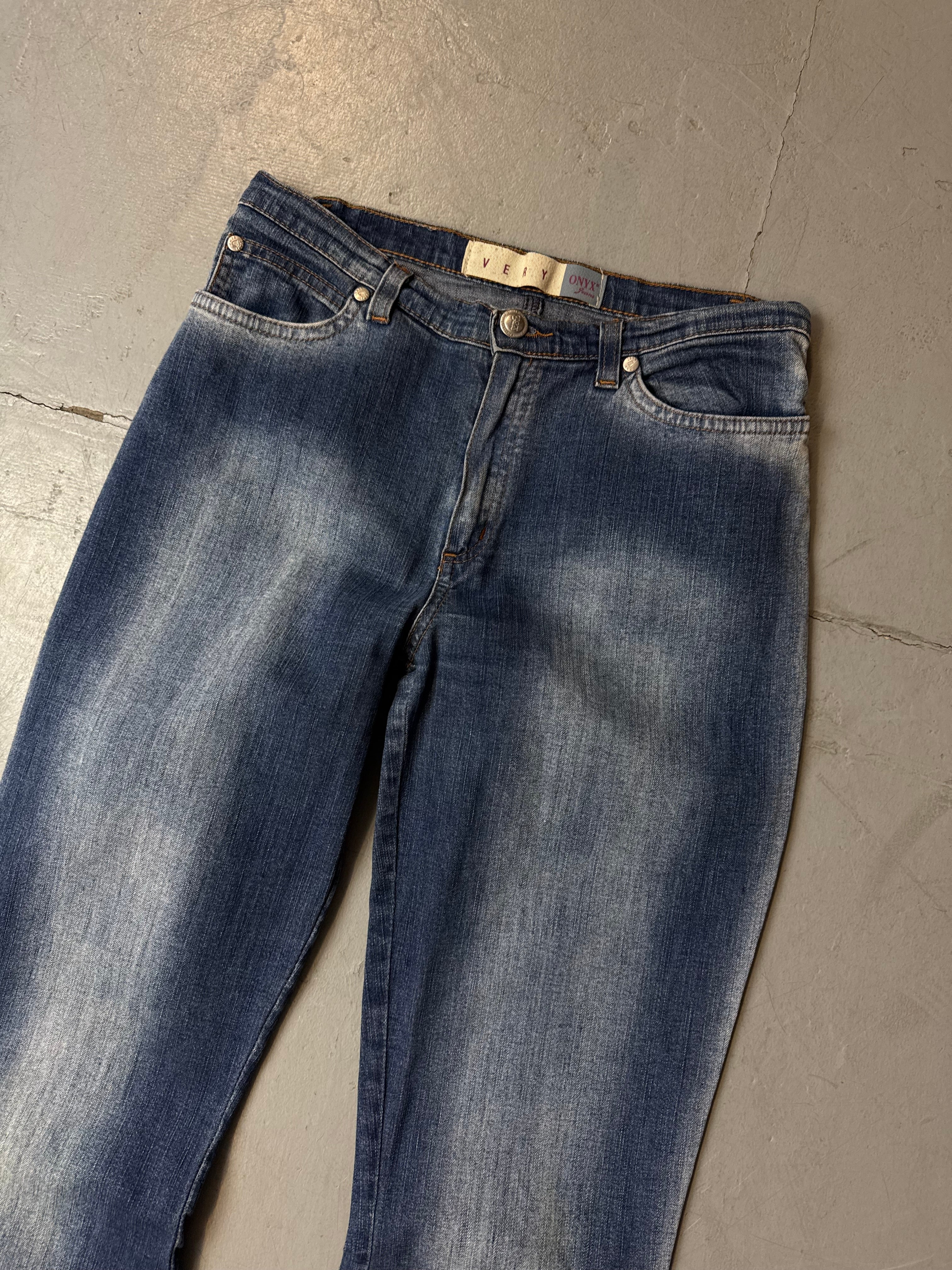 Vintage Onyx Flared Low Waist Jeans für Damen. Y2K Second Hand 2000s Fashion