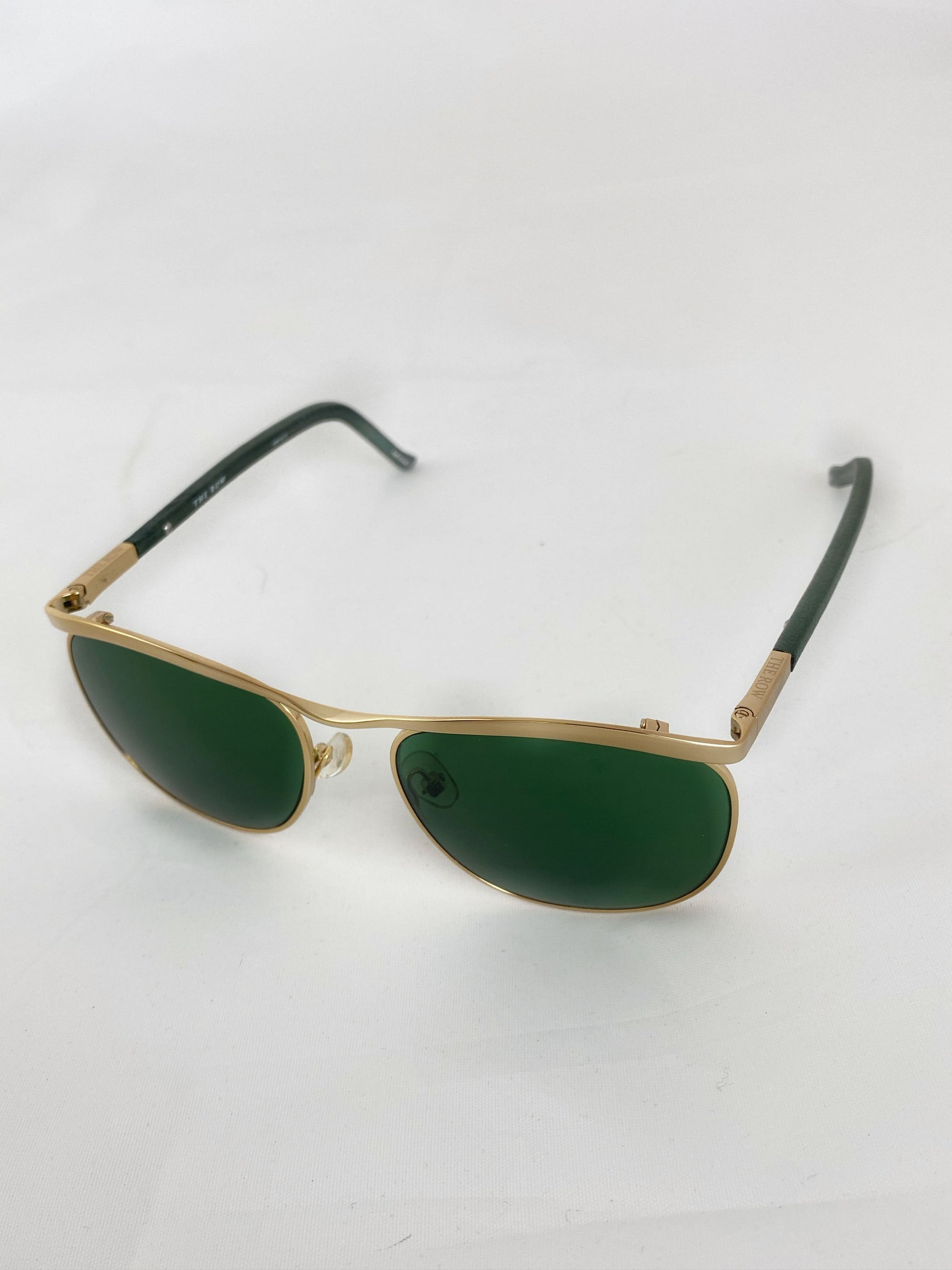 Produktbild der Linda Farrow Sunglasses The Row green/gold 5419-145 von vorne mit weißem Hintergrund.