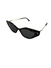 Laden Sie das Bild in den Galerie-Viewer, Produktbild der Mykita Sunglasses leo Gold flexible von der Seite vor weißem Hintergrund.